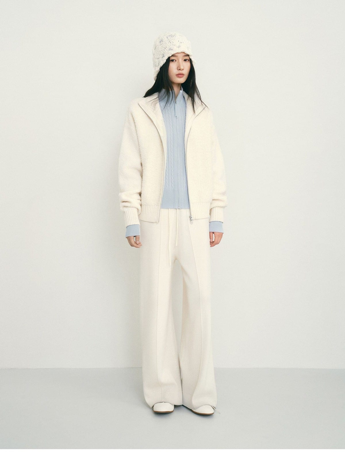 TEASEL Merino Wool Boucl Zip Cardigan in White - On Female Model