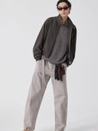 SIMPLE PROJECT Belted Garment Dyed Curved Jeans in Purple - On Male Model