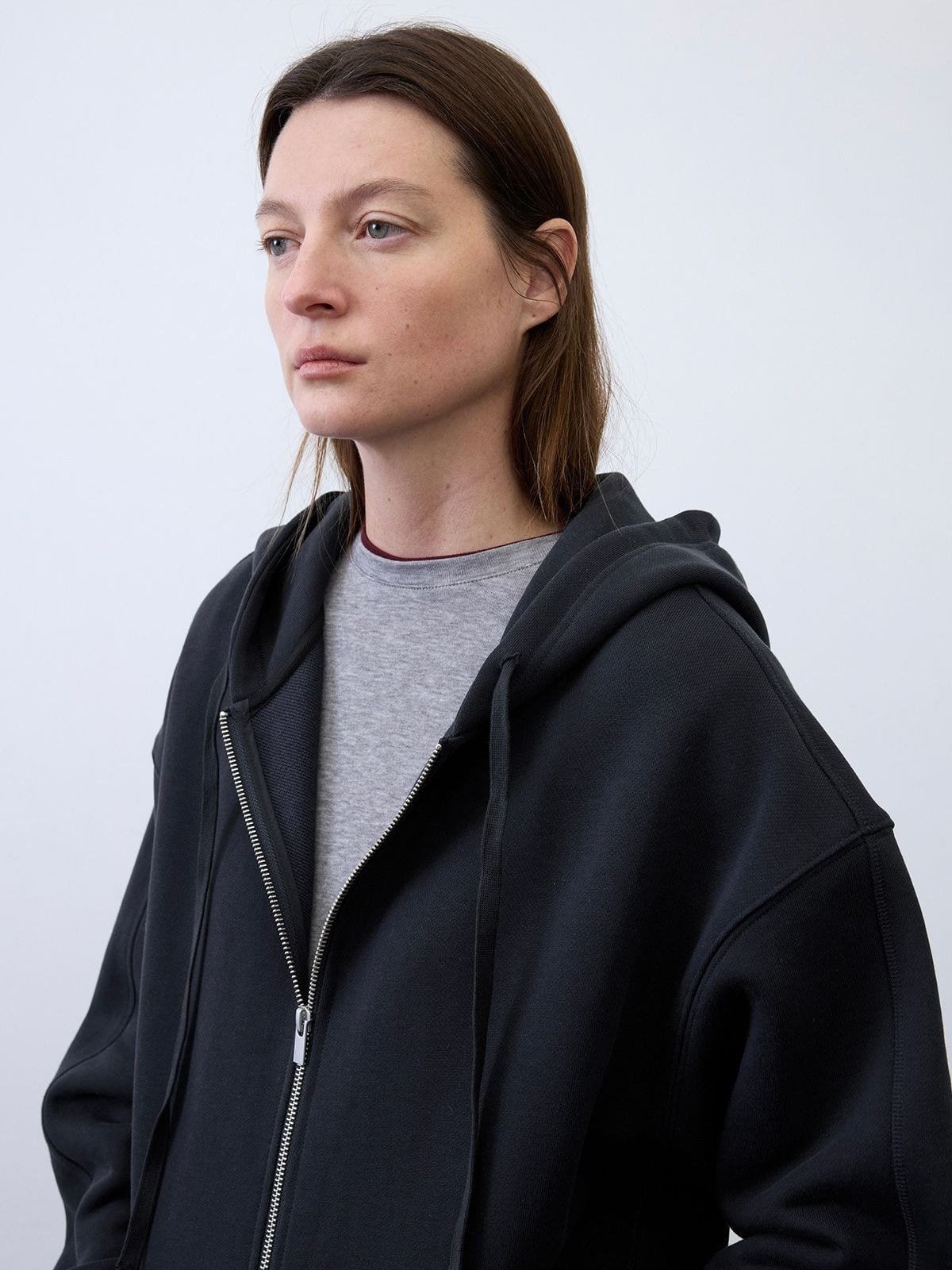 Random Piece Cotton Lyocell Zip Up Hoodie in Black - On Female Model