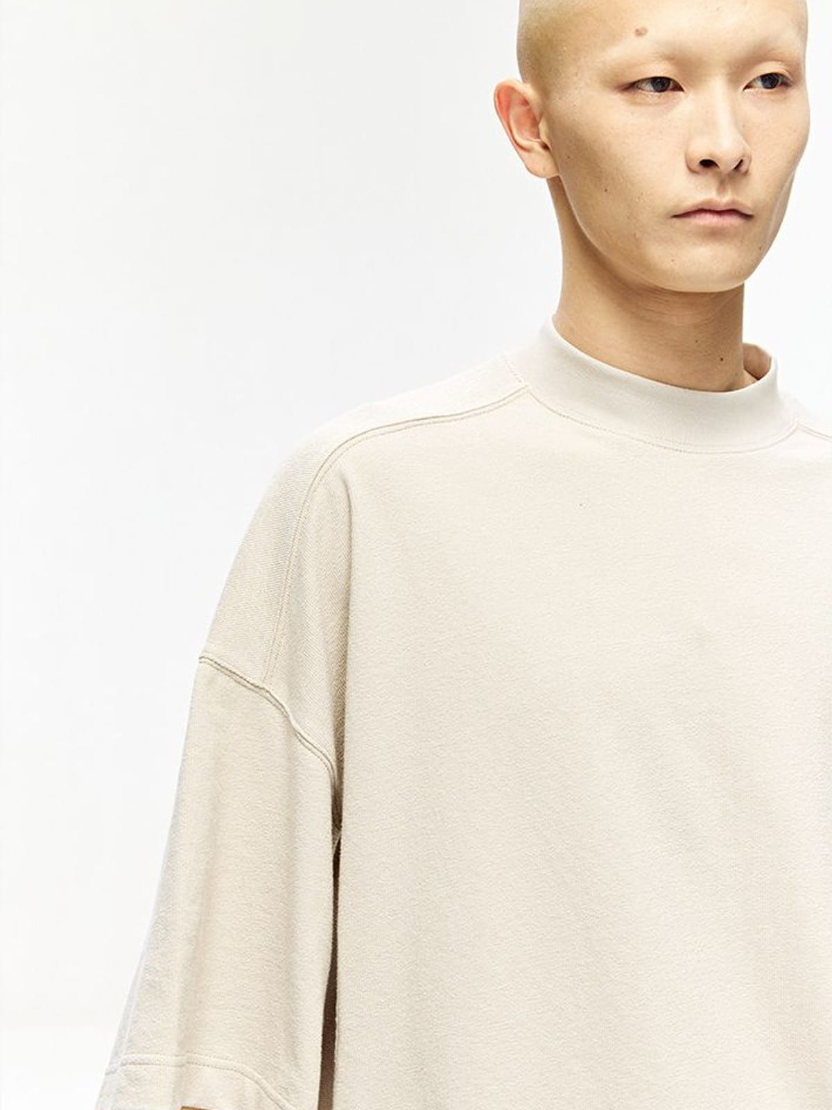 D5ove Boxy Mock Neck Cotton T Shirt in Beige - On Male Model