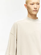 D5ove Boxy Mock Neck Cotton T Shirt in Beige - On Male Model