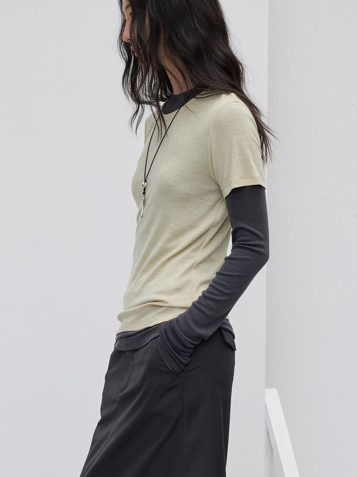 Random Piece Merino Wool U Neck Short Sleeve T Shirt in Beige - On Female Model
