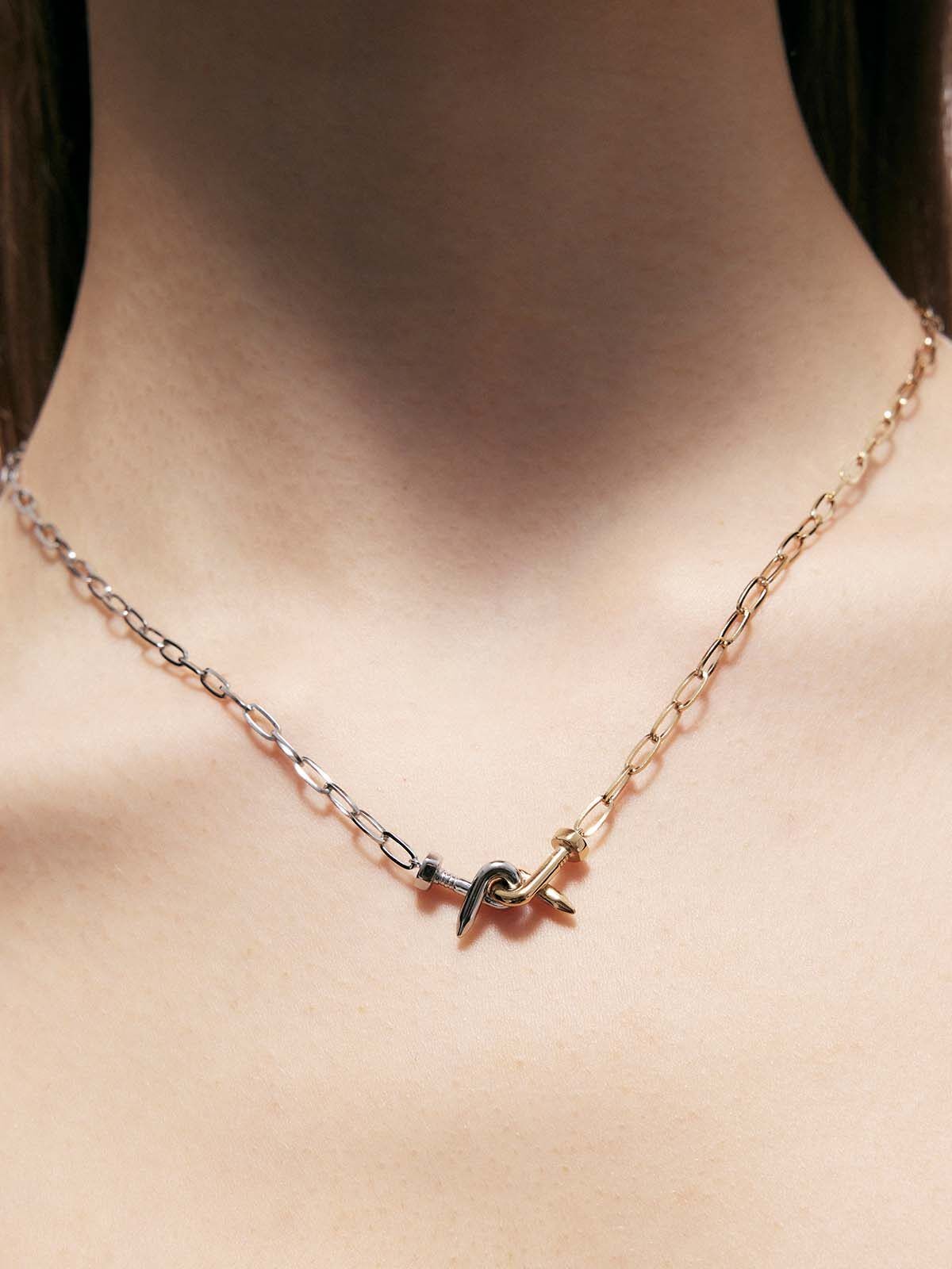 BLACKHEAD Two Tone Twisted Nail Steel Necklace in Gold - On Female Model