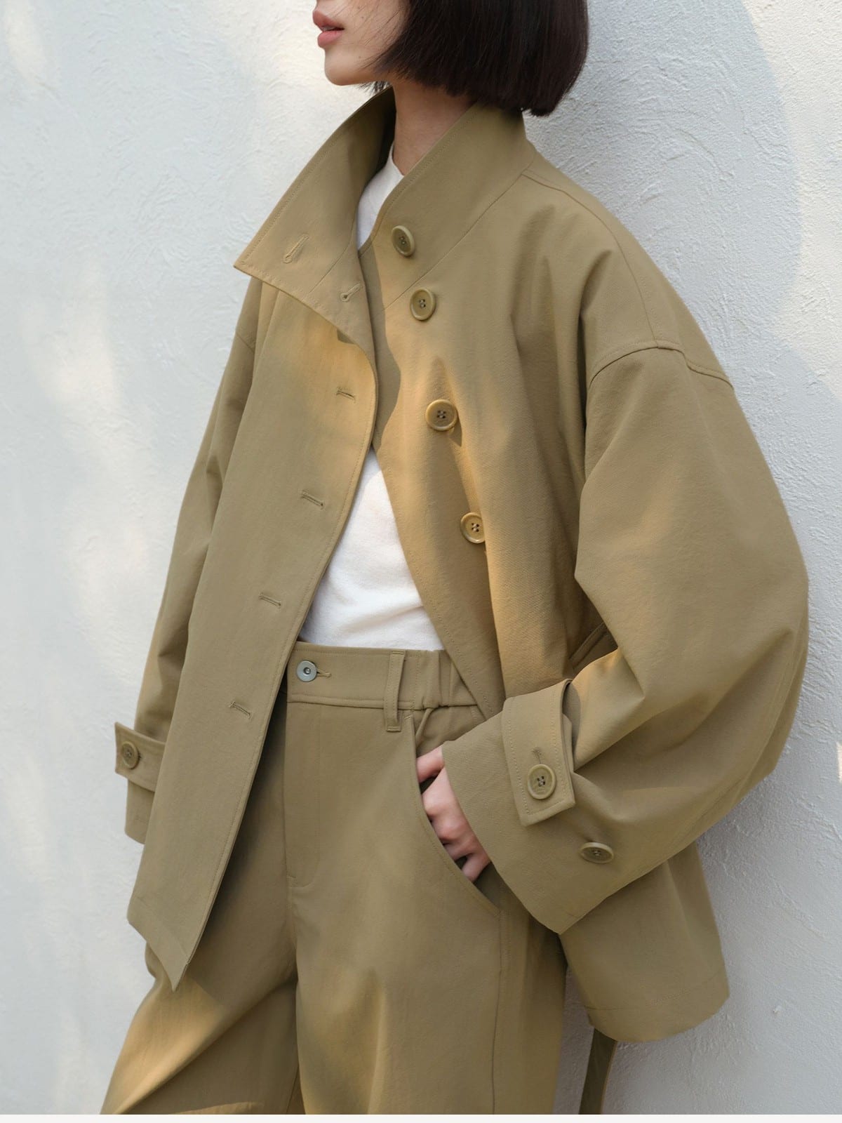 TEASEL Short Stand Collar Trench Coat in Khaki - On Female Model