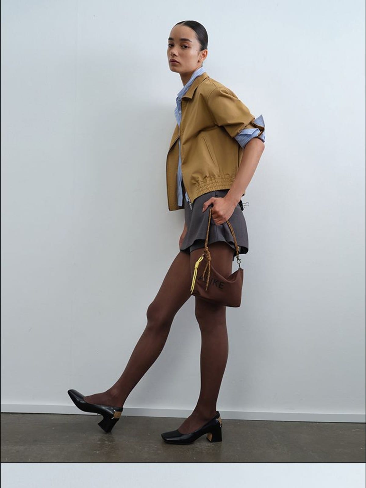 RARELY ALIKE Mock Layer Striped Cropped Jacket in Beige - On Female Model