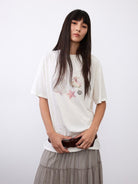 Random Piece Shell Print Cotton Lyocell T Shirt in Cream - On Female Model