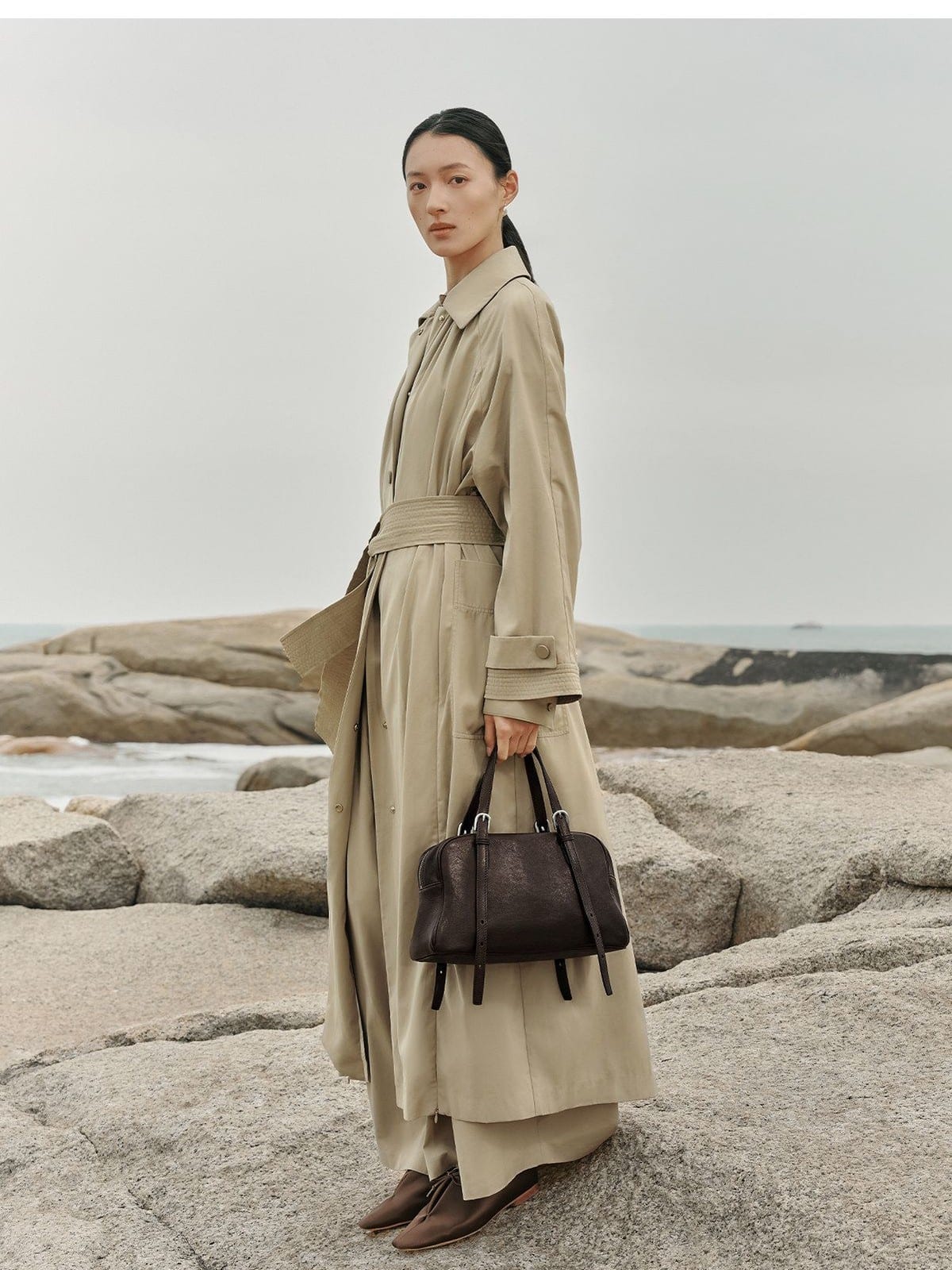 QIUZHEN Vegetable Tanned Kidskin Bowling Bag in Brown - On Female Model