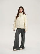 LOSTCTRL 90 White Duck Down Puffer Jacket in Cream - On Female Model