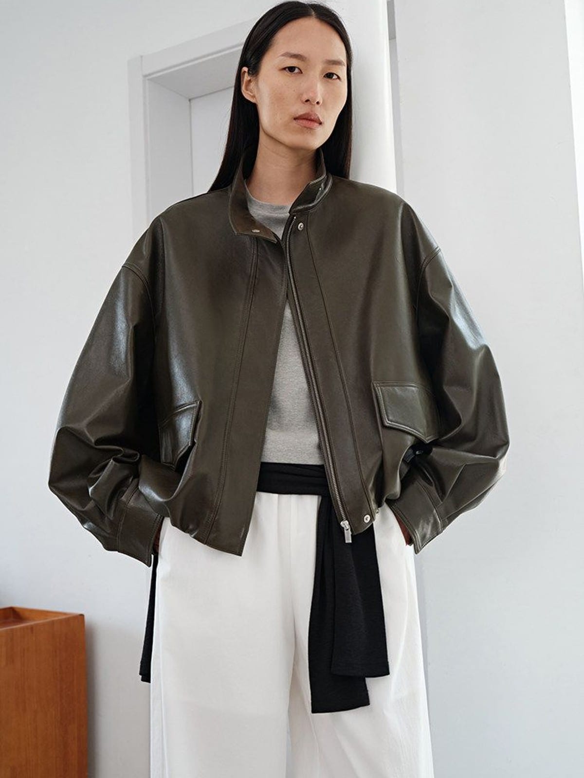MSBEAST Oil Waxed Sheepskin Stand Collar Jacket in Olive - On Female Model