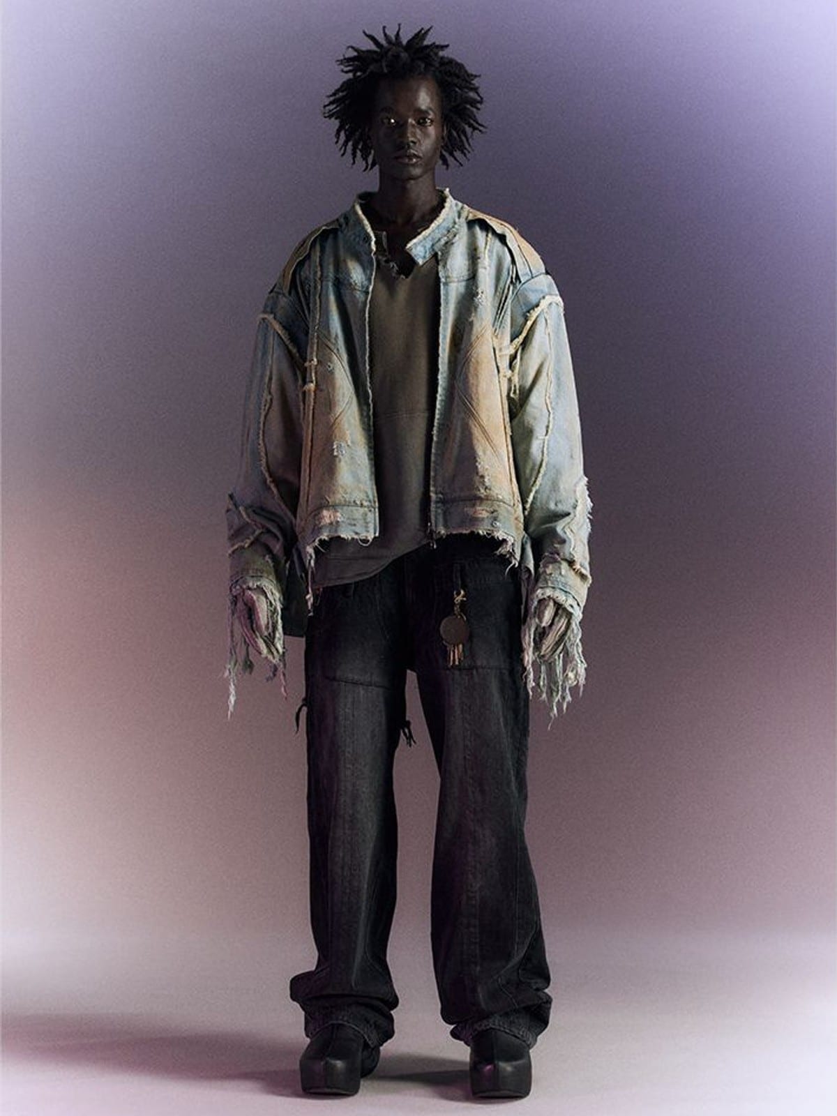 D5ove Mud Dyed Distressed Fringed Denim Jacket in Gray - On Male Model