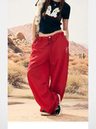 BeerBro Lightweight Parachute Pants in Red - On Female Model