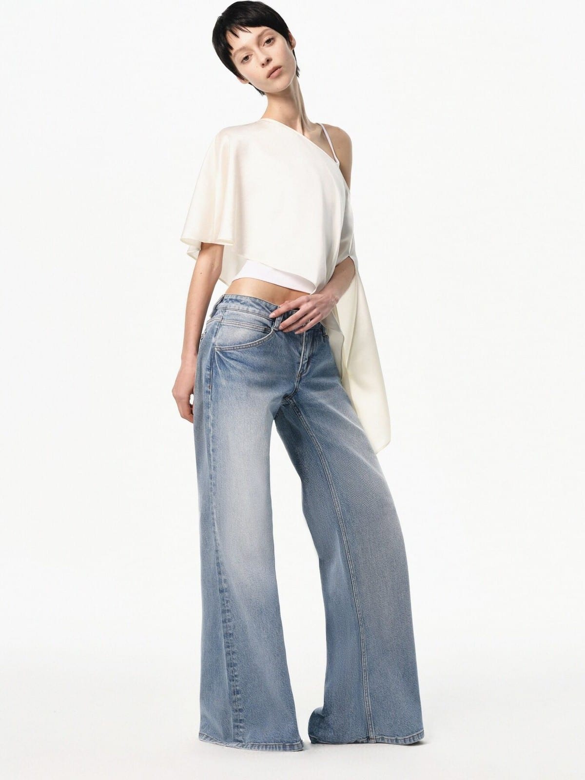 RARELY ALIKE Asymmetrical Satin One Shoulder Blouse in White - On Female Model