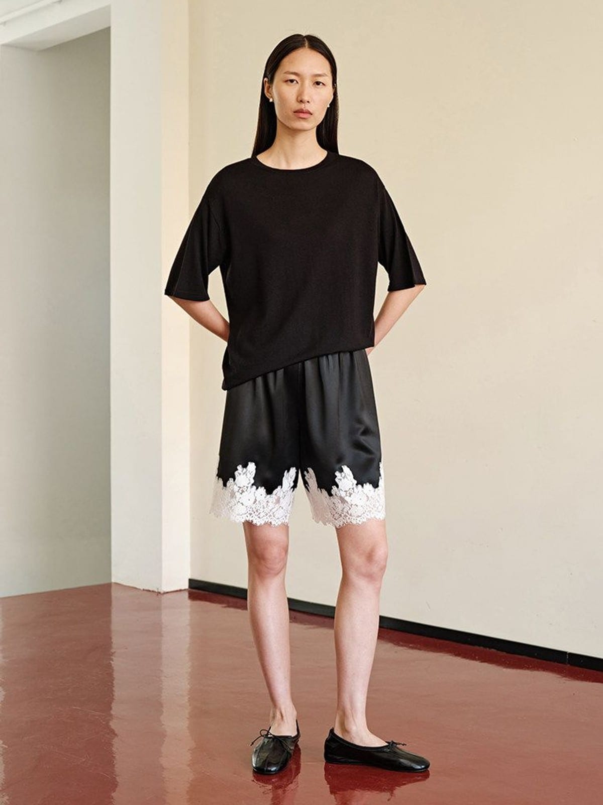 MSBEAST Wool Acetate Knit T Shirt in Black - On Female Model