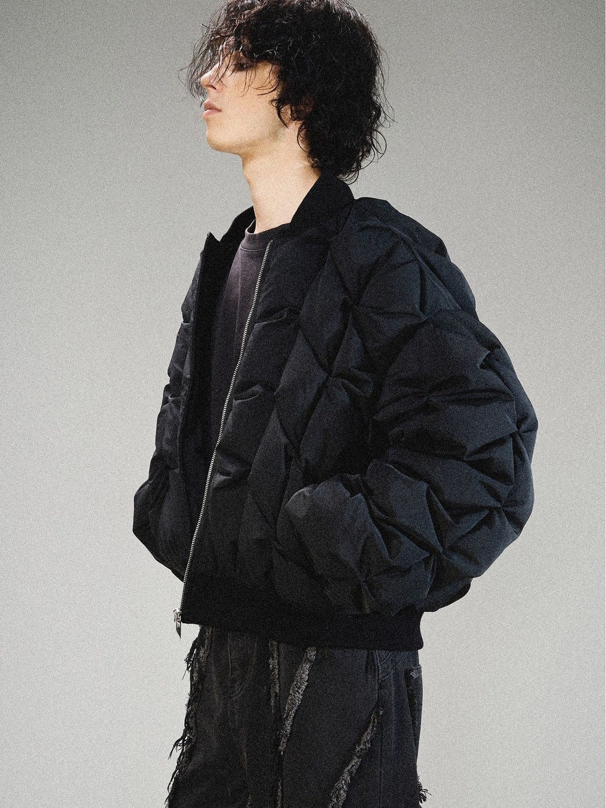 LOSTCTRL Crinkled Down Puffer Jacket in Black - On Male Model