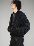 LOSTCTRL Crinkled Down Puffer Jacket in Black - On Male Model
