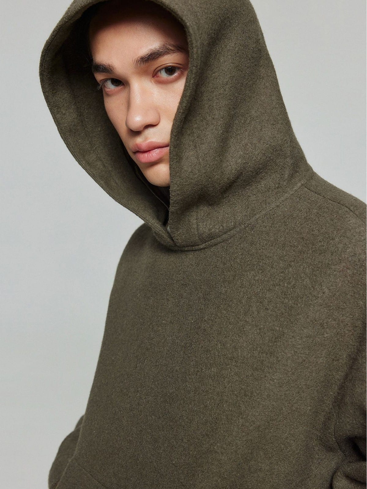 SIMPLE PROJECT Pure Wool Pullover Hoodie in Khaki - On Male Model