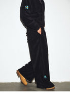 MEDM Lightweight Fleece Drawstring Sweatpants in Black - On Model