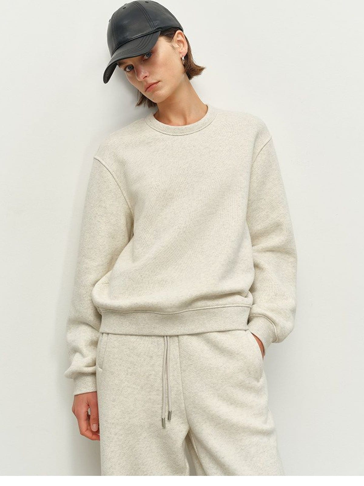 MSBEAST Fleece Lined Cotton Sweatshirt Pants Set in Beige - On Female Model