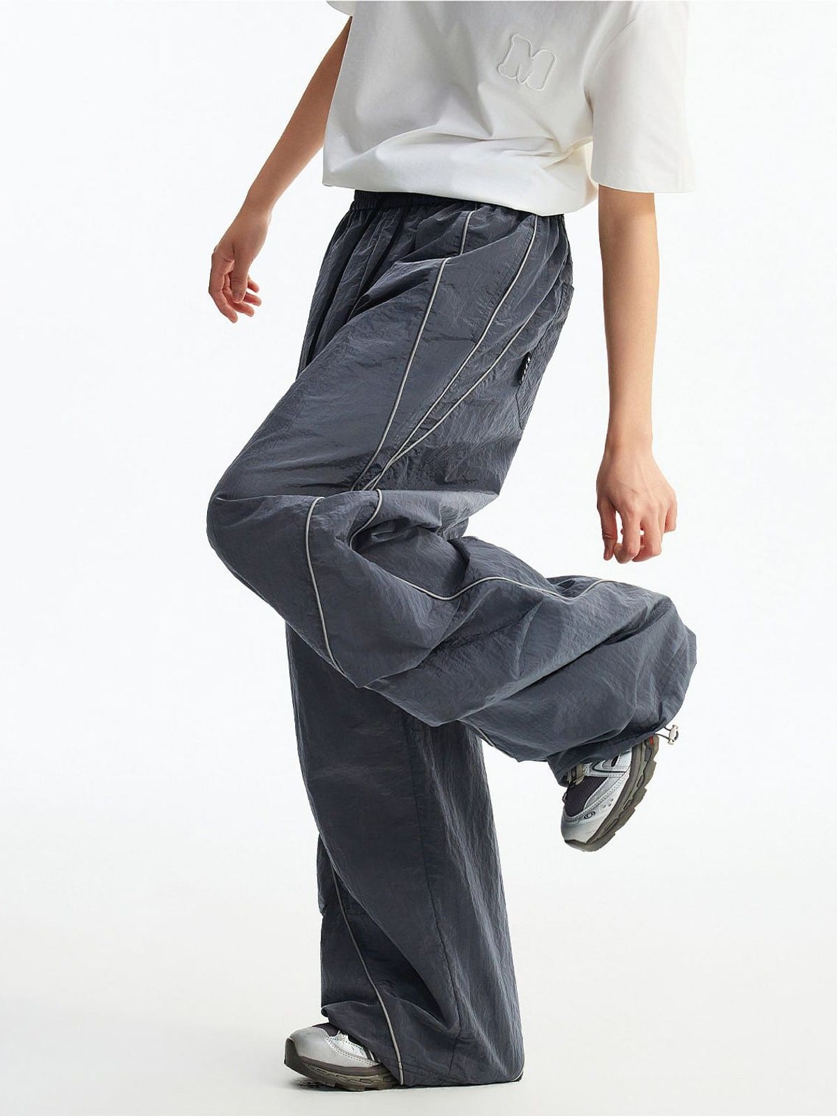 MEDM Glossy Piped Techwear Track Pants in Gray - On Model