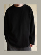 USAGE Slub Cotton Raglan Sweatshirt in Black - On Male Model