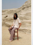 Retro 21 Pleated Straight Leg Trousers in Beige - On Male Model