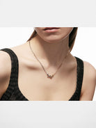 BLACKHEAD Two Tone Twisted Nail Steel Necklace in Gold - On Female Model