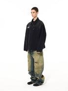 UNKNOWNWORLD Sun Faded Canvas Racing Jacket in Black - On Female Model