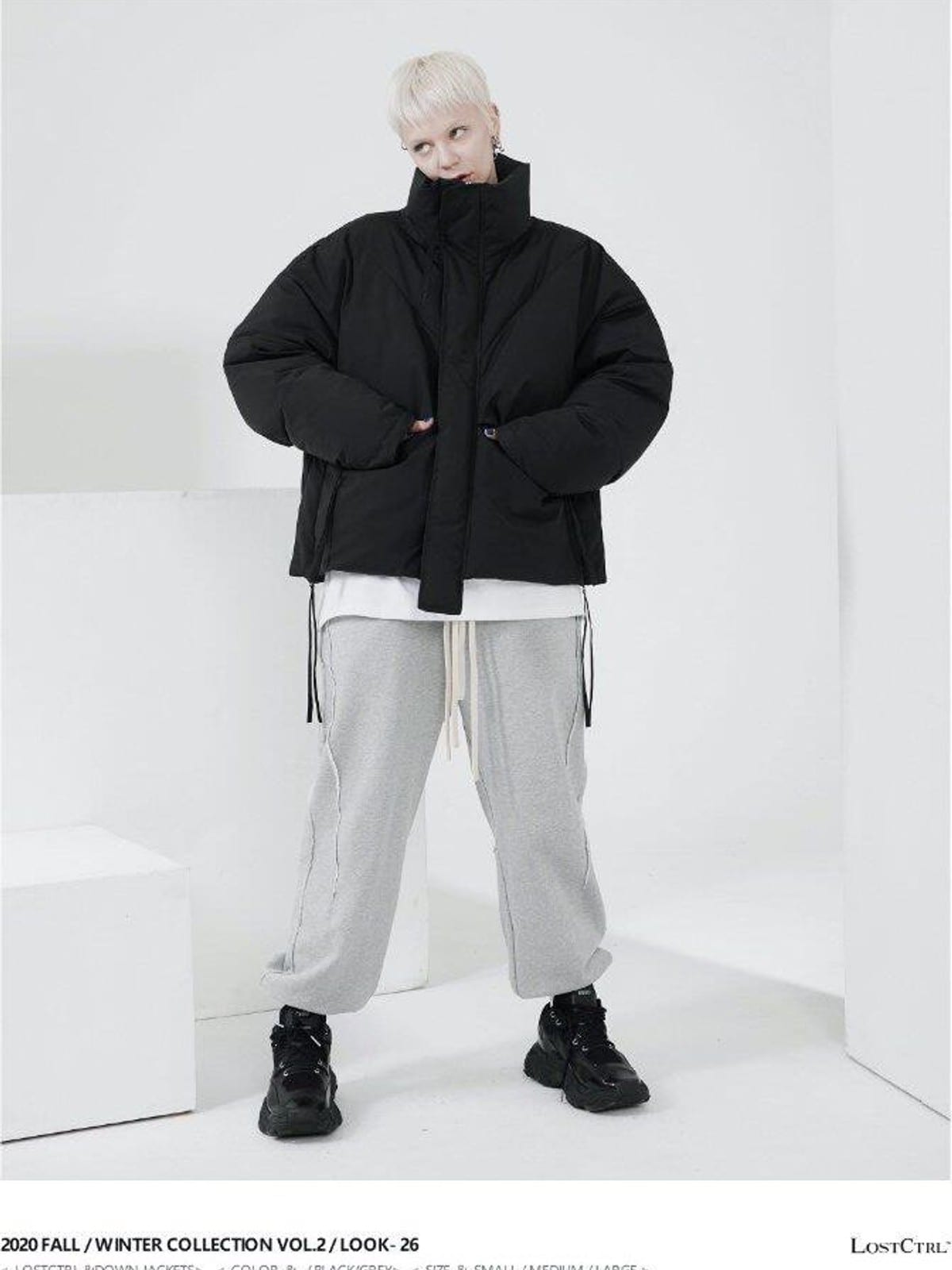 LOSTCTRL Deconstructed Down Blend Puffer in Black - On Female Model