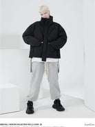 LOSTCTRL Deconstructed Down Blend Puffer in Black - On Female Model