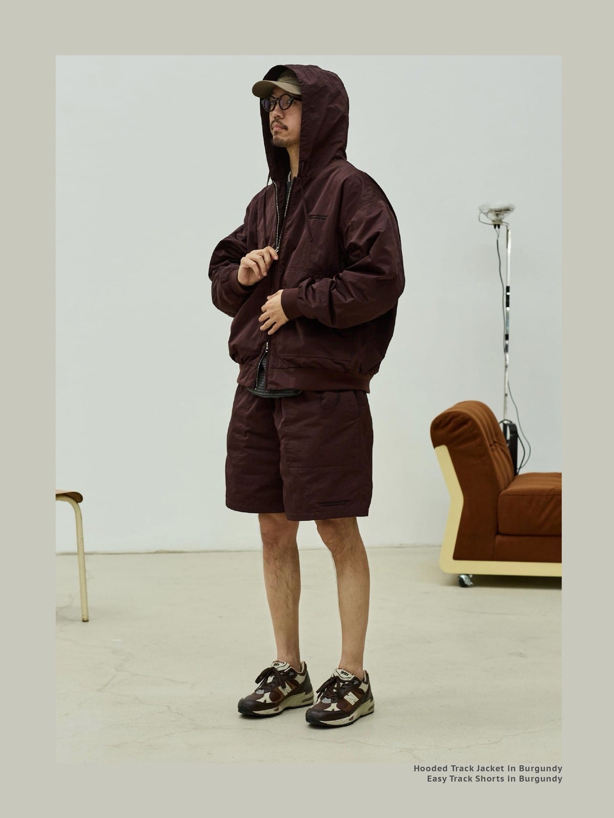 USAGE Crinkle Nylon Hooded Track Jacket in Brown - On Male Model