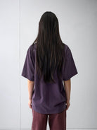 Random Piece Distressed Cotton Blend T Shirt in Purple - On Model