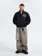 MEDM Nylon Stand Collar Coach Jacket in Black - On Male Model