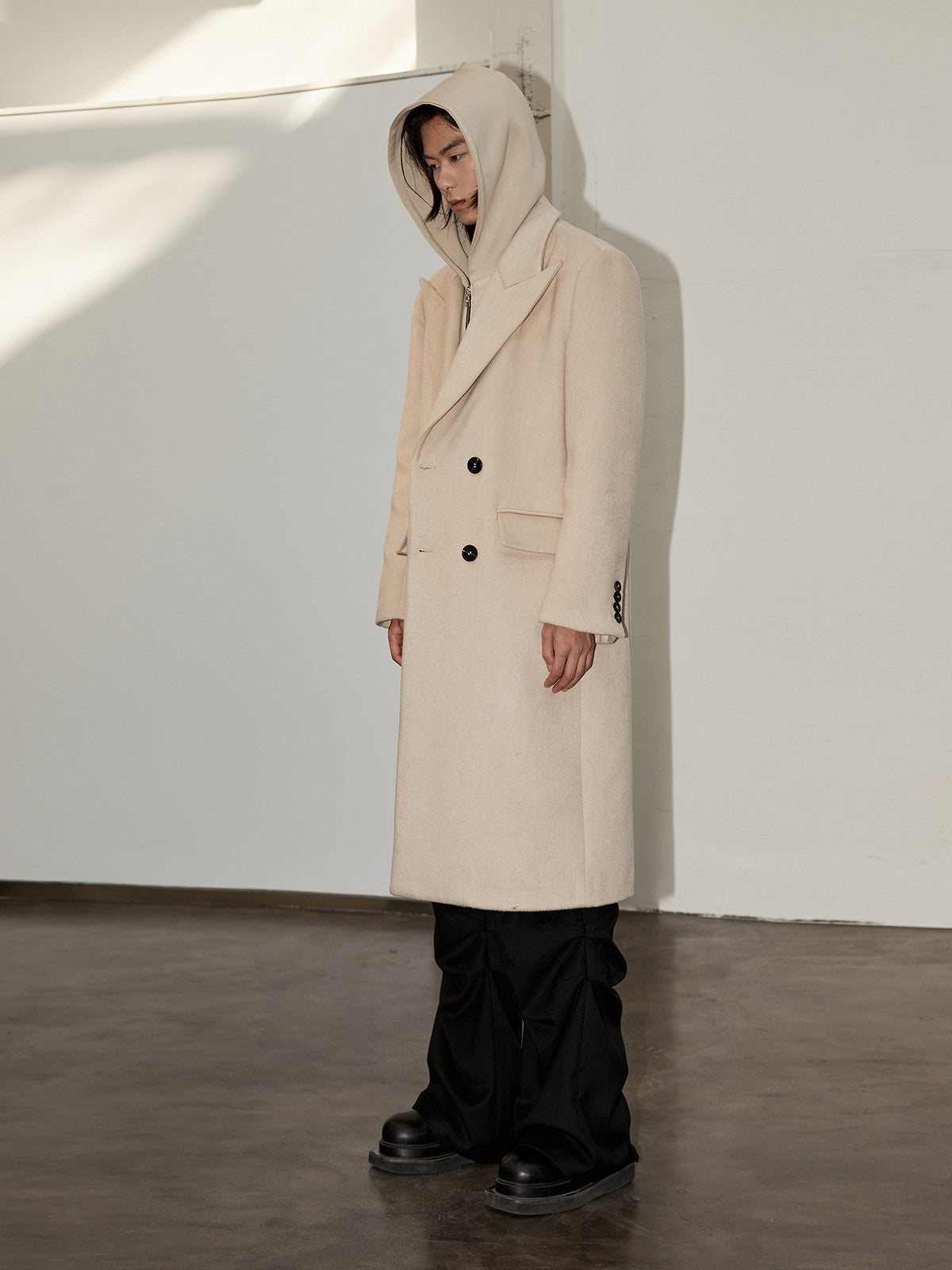 Y OFFICIAL Double Faced Wool Blend Hooded Coat in Black - On Male Model