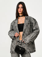SMFK Small Leather Badge Chain Crossbody in Black - On Female Model