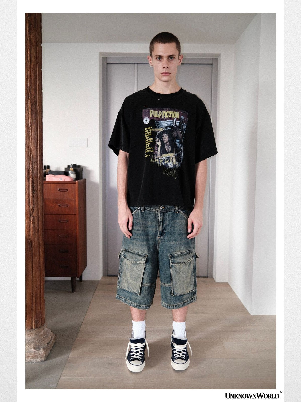 UNKNOWNWORLD Mud Dyed Multi Pocket Denim Shorts in Blue - On Male Model
