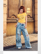 BeerBro Distressed Dirty Wash Relaxed Jeans in Blue - On Female Model