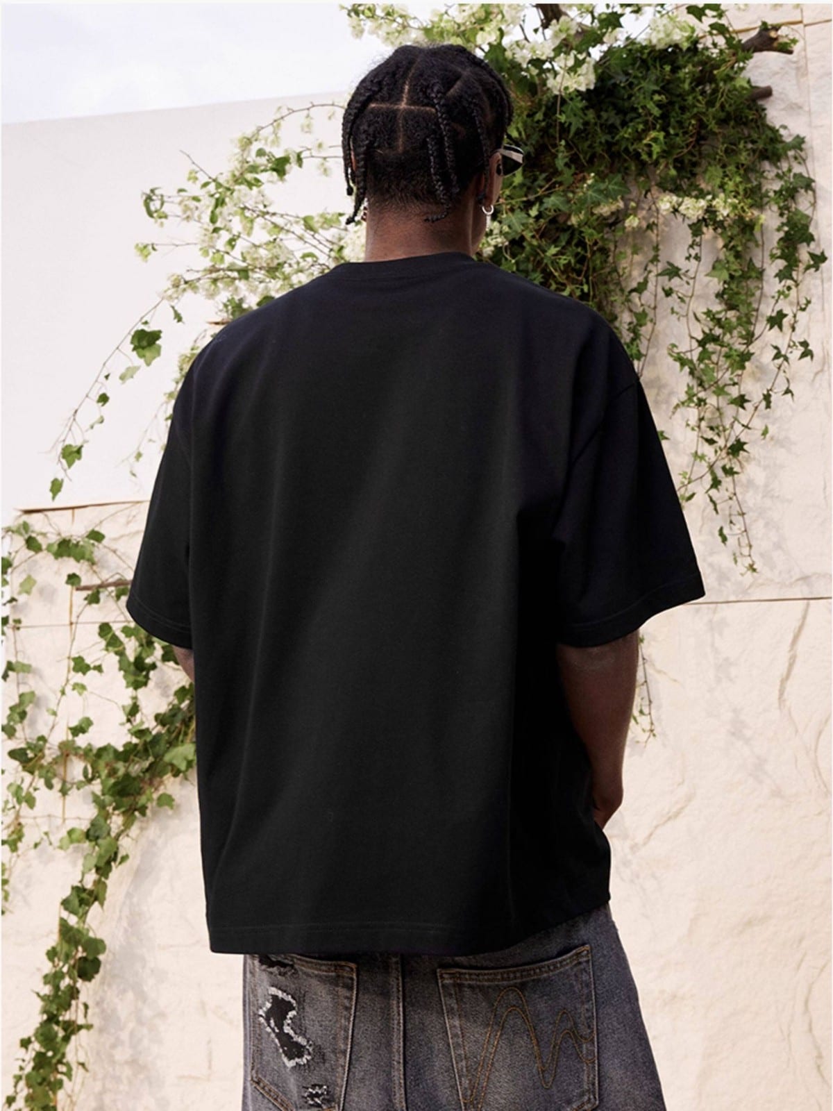 MEDM Tufted Logo Cotton T Shirt in Black - On Model