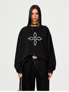 SMFK Cross Print Cotton Sweatshirt in Black - On Female Model