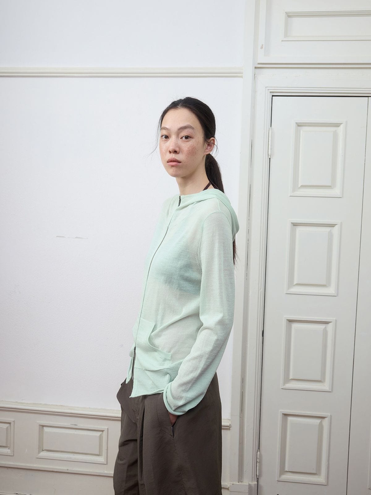 Random Piece Lightweight Merino Hooded Zip Cardigan in Mint - On Female Model