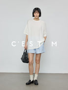 CEST M Striped Organic Pima Cotton Shorts in Sky Blue - On Female Model