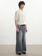 JCAESAR STUDIO Pointelle Ribbed Cotton Polo in White - On Male Model