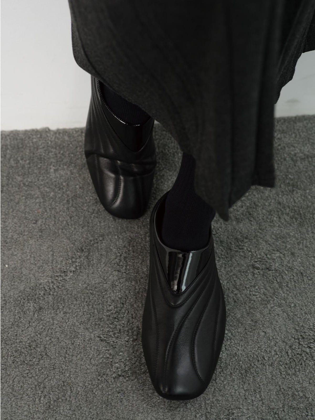 JCAESAR STUDIO Quilted Calfskin Racing Sneakers in Black - On Model