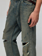 SIMPLE PROJECT Distressed Vintage Wash Flare Jeans in Blue - On Male Model