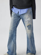 SIMPLE PROJECT Distressed Patchwork Flared Jeans in Blue - On Model