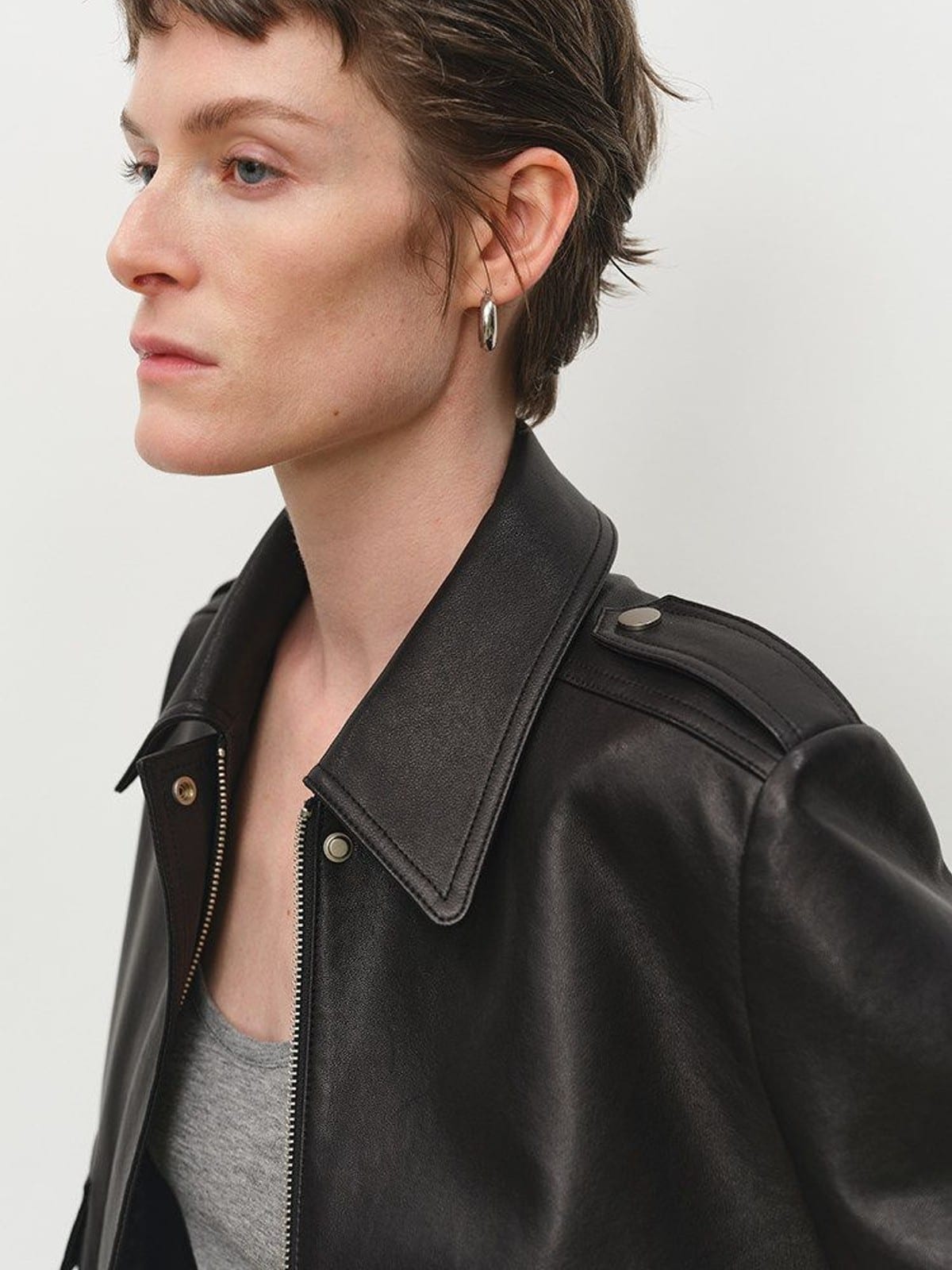 MSBEAST Cropped Sheepskin Moto Jacket in Black - On Female Model