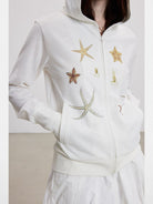 THELIGHT OFFICIAL Starfish Print Zip Up Hoodie in White - On Female Model