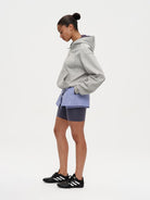 RARELY ALIKE Cinched Waist Logo Zip Up Hoodie in Gray - On Female Model