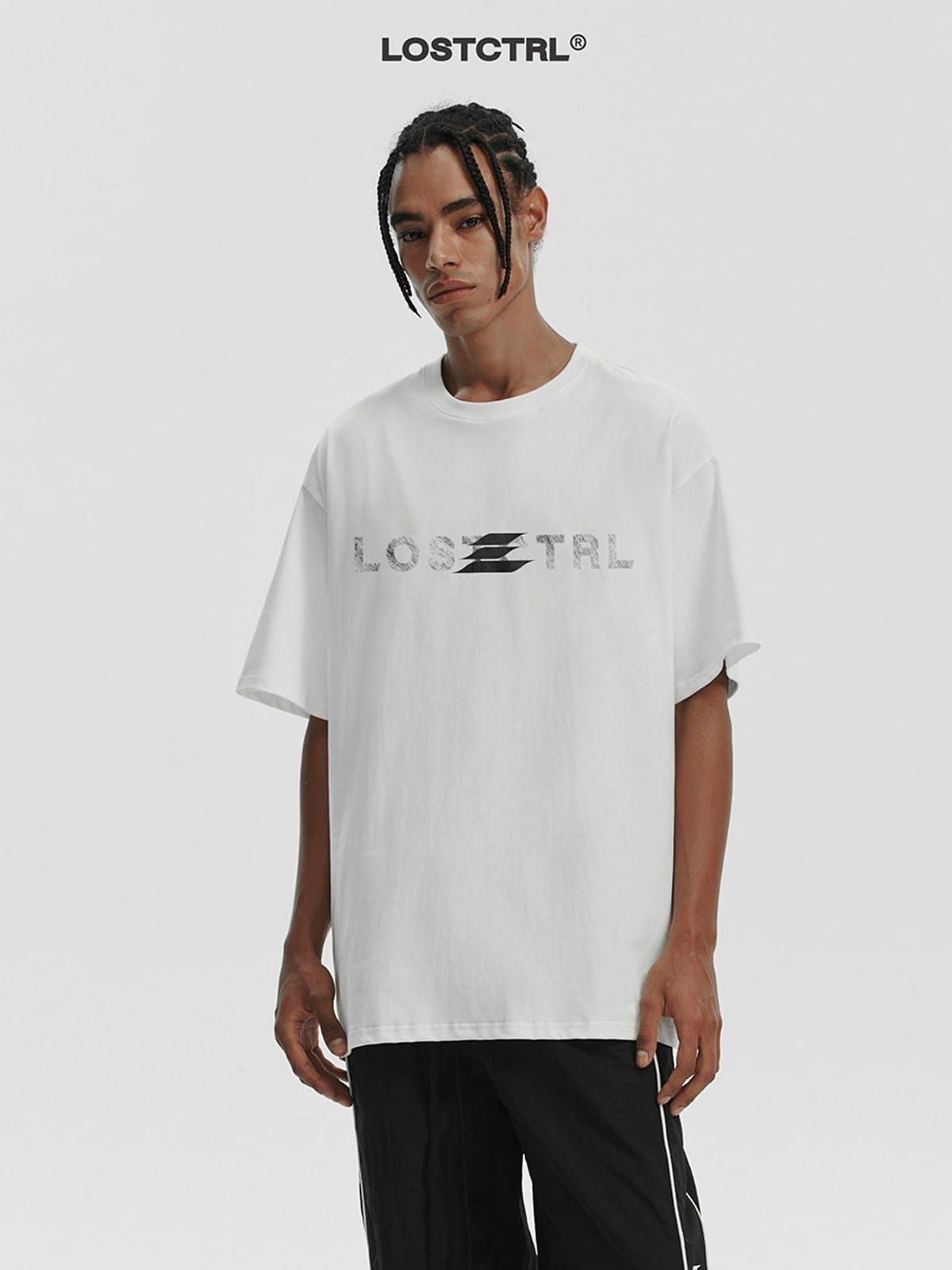 LOSTCTRL Distressed Logo Print Cotton T Shirt in White - On Male Model