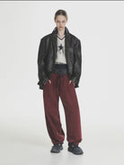 MASONPRINCE Wide Leg Inverted Pleat Sweatpants in Burgundy - On Female Model