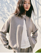 TEASEL Worsted Wool Mock Neck Cardigan in Cream - On Female Model